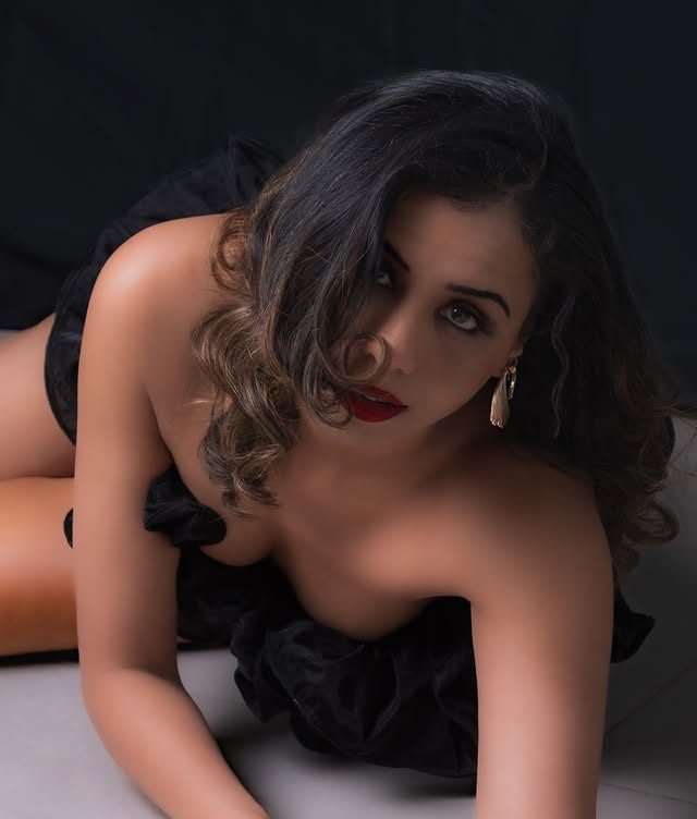 Natasha in a black dress, studio glamour portrait